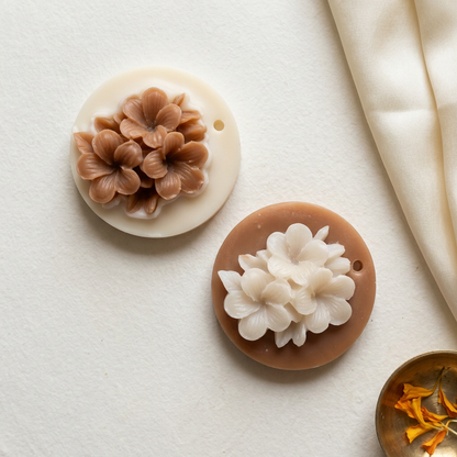 Brown and ivory sachets with subtle Diwali styling